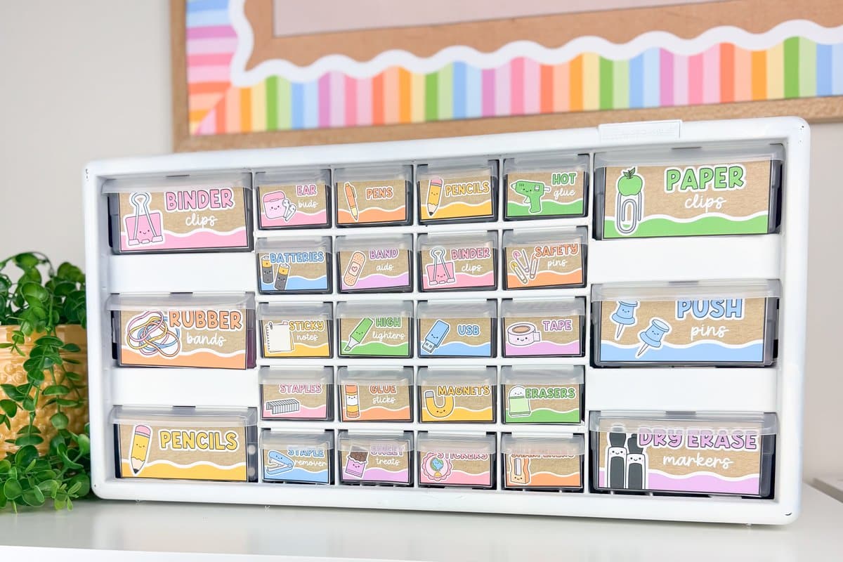 Krafty Brights teacher toolbox labels on a white drawer organizer: binder clips, pens, pencils, sticky notes and more on kraft paper