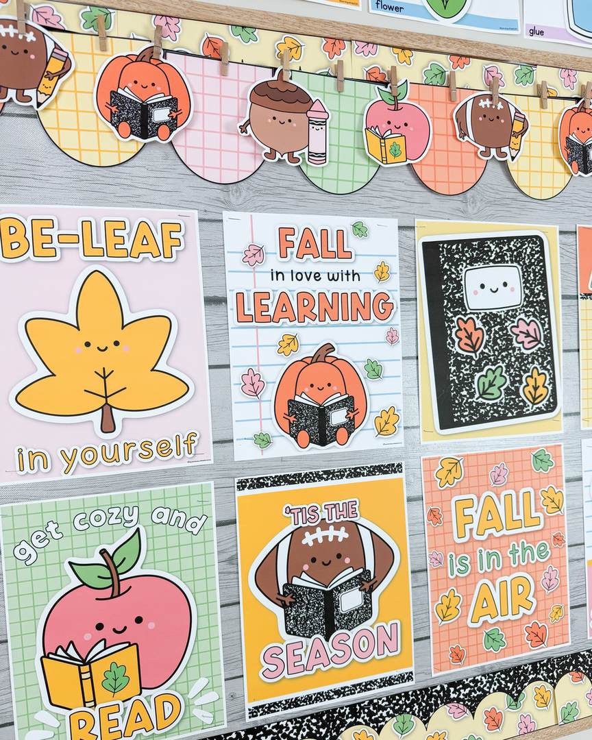 Fall classroom posters on a bulletin board: Be-leaf in yourself, Fall in love with learning, Get cozy and read, 'Tis the season, Fall is in the air